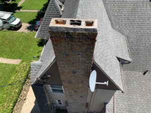 Chimney with damaged Concrete Crown and Flue Tiles Before Rebuild