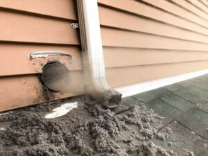 Lint collected Lint collected from Dryer Vent laying on rooftop still blowing out lint. Dryer Vent